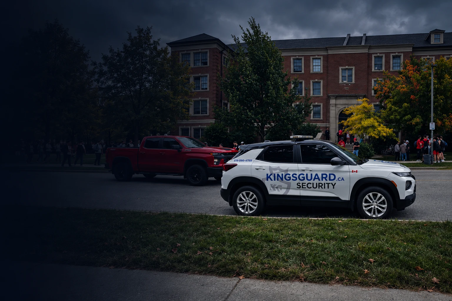 Marked KingsGuard patrol SUV parked on a university campus.