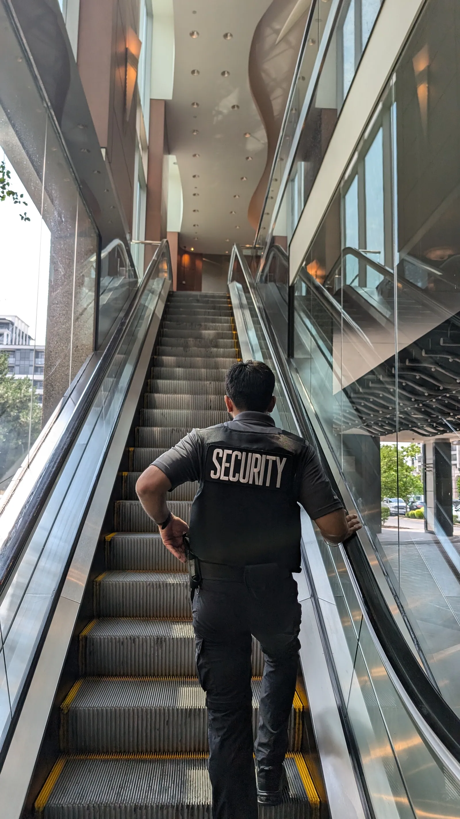 KingsGuard guard patrolling a commercial office lobby